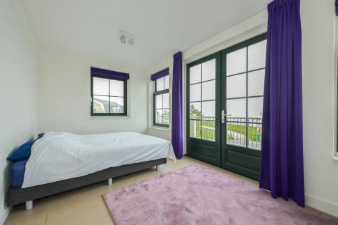 The Slaapkamer 1 of Type Zuiderzeezicht - nr. 227 in Resort Poort van Amsterdam