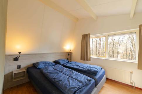 The Slaapkamer 2 of Type Bosvilla Comfort 6-7 - nr. 21 Spirea in Landal Bungalowpark Hoenderloo