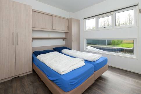 The Slaapkamer 1 of Type Fuut 4 - nr. 24 in Vakantiepark Giethoorn