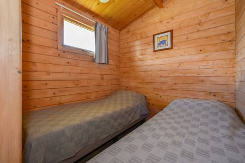 The Slaapkamer 2 of Type Buitenverblijf Comfort 6 - nr. 301 in Resort Arcen