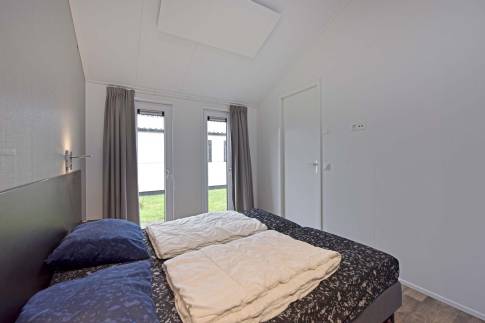 The Slaapkamer 1 of Type Ooievaar kindvriendelijk - nr. 65 in Vakantiepark Giethoorn