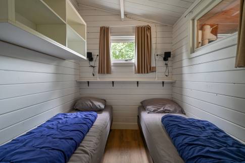 The Slaapkamer 1 of nr. 318 -  type Buitenverblijf Wellness 4 in Resort Arcen