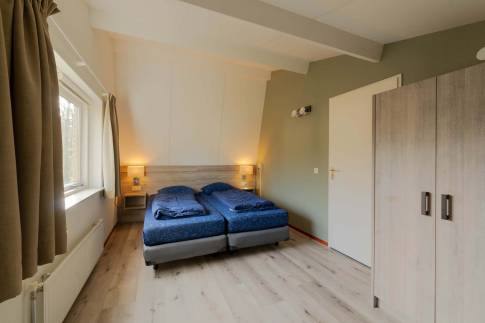 The Slaapkamer 2 of Type Bosvilla Comfort 6-7 - nr. 16 Moerbei in Landal Bungalowpark Hoenderloo