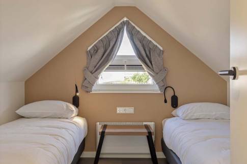 The Slaapkamer 4 of Type Strandlodge 8 - nr. 14 in Vakantiepark Boomhiemke