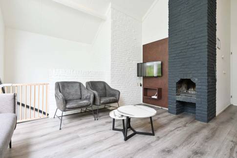 The Woonkamer of Type Wellness Bungalow - nr. B14 in Vakantiepark De Bosrand