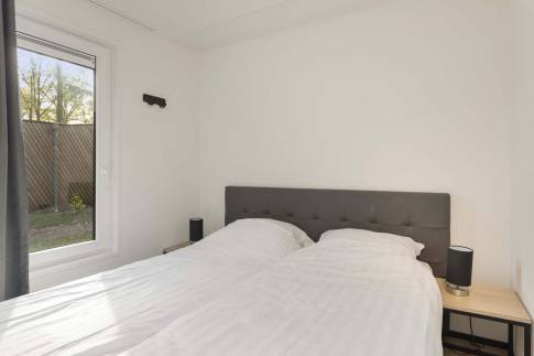 The Slaapkamer 1 of Type Forest Cabin 4 - nr. 130 in Vakantiepark Schaijk