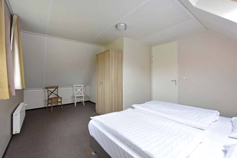 The Slaapkamer 3 of nr. 137 - type 6EL in Dormio Strand Resort Nieuwvliet-Bad