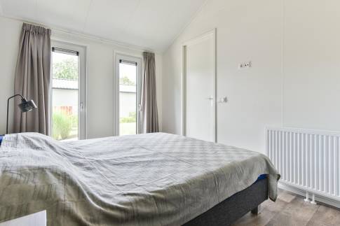 The Slaapkamer 1 of Type Chalet - nr. 226 in Vakantiepark Aan De Maas