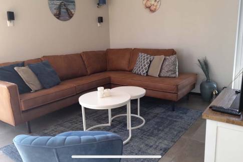 The Woonkamer of nr. 137 - type 6EL in Dormio Strand Resort Nieuwvliet-Bad