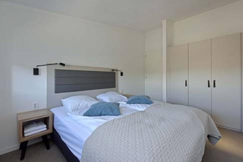 The Slaapkamer 1 of Type Studio Deluxe Landzijde 2p - nr. 2a in Beach Resort Punt West