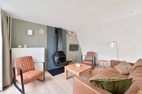 The Woonkamer of Type Veluwe Villa 4B - nr. 73 Pijplook in Landal Bungalowpark Hoenderloo