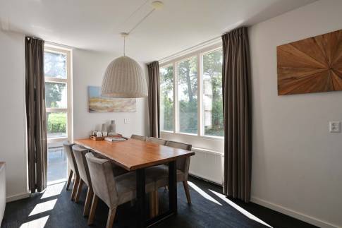 The Eetkamer of nr. 022 - type 6L1 in Landal Beach Resort Ooghduyne