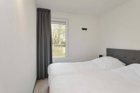 The Slaapkamer 2 of Type Forest Cabin 4 - nr. 130 in Vakantiepark Schaijk