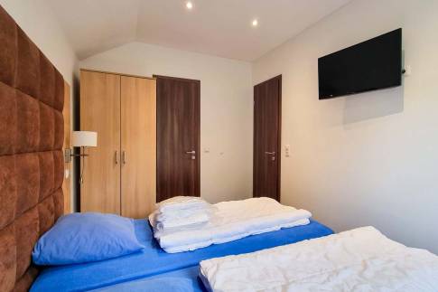 The Slaapkamer 1 of Type Landhaus 6 Luxe - nr. 35 in Eifelpark Kronenburger See