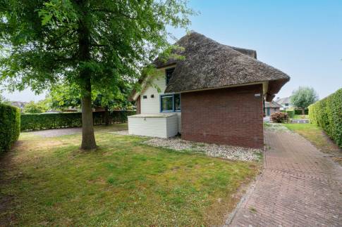 The Tuin of nr. 021 - type Breeuw 4 in Waterpark Belterwiede