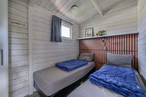 The Slaapkamer 1 of nr. 305 - type Buitenverblijf Wellness 4 in Resort Arcen