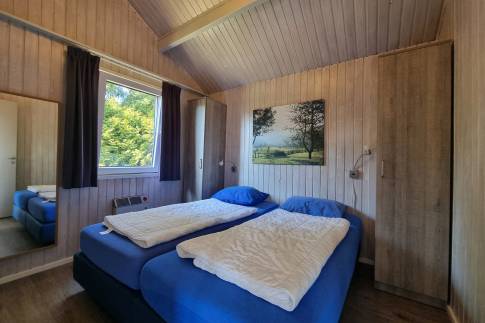 The Slaapkamer 1 of nr. 026 - type Kronenburg Comfort 4 in Eifelpark Kronenburger See