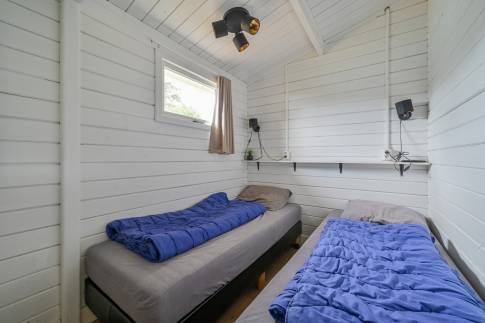 The Slaapkamer 2 of nr. 318 -  type Buitenverblijf Wellness 4 in Resort Arcen