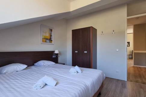 The Slaapkamer 1 of Type Penthouse Staffelsee Extra Luxe - nr. 123 in Dormio Resort Eifeler Tor