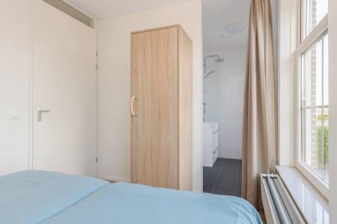 The Slaapkamer 1 of Type Speeltoren - nr. 317 in Resort Poort van Amsterdam