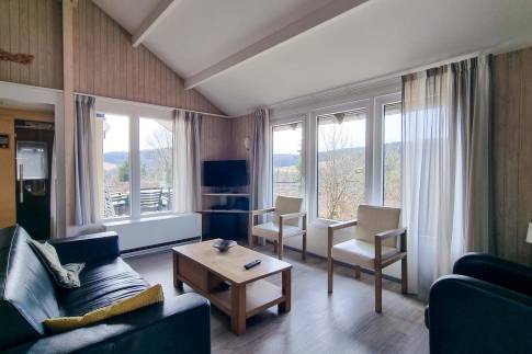 The Woonkamer of Type Kronenburg Comfort met Sauna 4 - nr. 57 in Eifelpark Kronenburger See