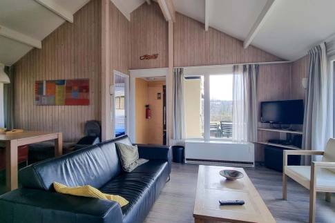 The Woonkamer of Type Kronenburg Comfort met Sauna 4 - nr. 57 in Eifelpark Kronenburger See