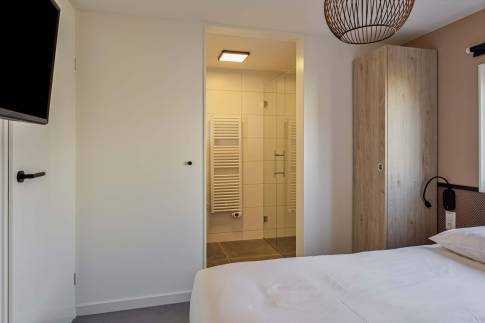 The Slaapkamer 2 of Type Strandlodge 8 - nr. 36 in Vakantiepark Boomhiemke