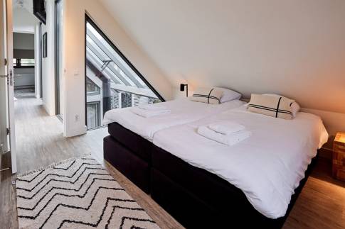 The Slaapkamer 4 of Type 8-persoons Wellness Tub & Sauna - nr. 13 in Vakantiepark Duynvoet