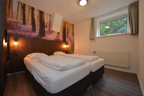 The Slaapkamer 1 of Type Bungalow - nr. 8 in Vakantiepark De Bosrand