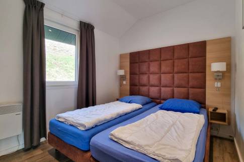 The Slaapkamer 2 of Type Landhaus 6 Luxe - nr. 35 in Eifelpark Kronenburger See