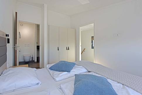 The Slaapkamer 1 of Type Studio Deluxe Landzijde 2p - nr. 2a in Beach Resort Punt West